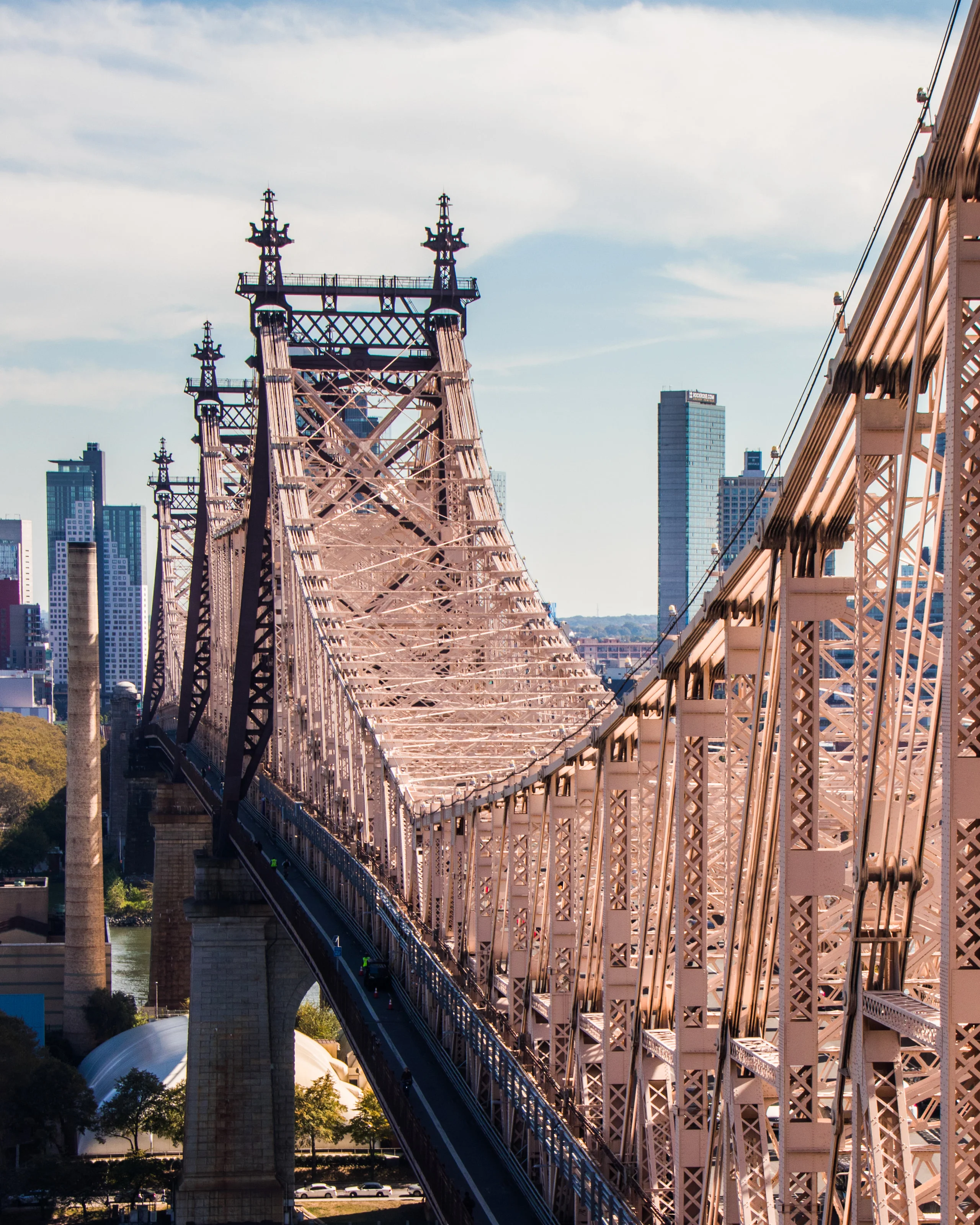The steel towers and trusses of the Queensboro Bridge in warm afternoon light